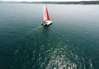 sailing yacht trimaran at sea